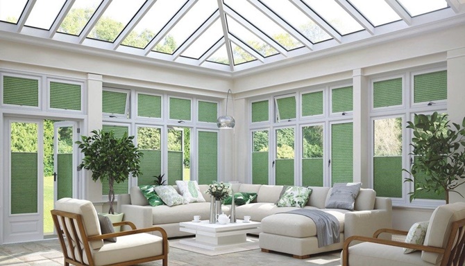 Large conservatory with green blinds