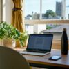 macbook pro on brown wooden table